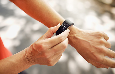 Image showing Smart watch, closeup and heart rate of person for fitness, exercise and workout from above. Stopwatch, hands and runner check pulse, timer and monitor healthy training progress, clock and sports gear