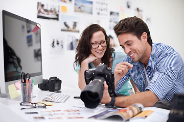 Image showing Happy photographers, smile and camera at office for photo, memory or teamwork at the studio. Man and woman in team photography smiling for digital advertising, marketing or photos at the workplace