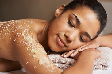 Image showing Woman, body scrub or back massage in spa to relax for zen, sleeping or wellness physical therapy in resort. Relaxed girl client in salon to exfoliate for luxury skincare treatment or beauty therapy