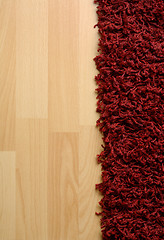 Image showing Rug on laminate floor