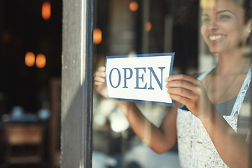 Image showing Cafe open sign, window or woman happy, smile and pride for retail service, restaurant welcome or coffee shop. Small business owner, female manager or waitress person smiling for startup store opening