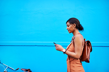 Image showing Space, phone and travel with woman by wall for communication, social media and internet. Technology, connection and contact with female mobile user in city for mockup, networking and app