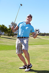 Image showing Happy golfer man, fist celebration and game on grass with winning, goal or outdoor for sports, exercise or contest. Senior guy, winner and excited at golf course with sunshine, competition or workout