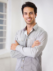 Image showing Portrait, smile and man with his arms crossed, fashion and handsome with happiness, aesthetics or casual outfit. Face, male person or gentleman with joy, Canada and wellness with a positive attitude
