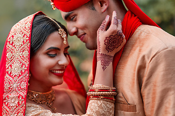 Image showing Wedding, marriage and hand henna with couple together in celebration of love at a ceremony. Happy, romance or islamic with a husband and wife getting married outdoor in tradition of their culture