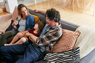 Image showing Mom, dad and kid relax on couch in living room for love, care and quality time together in happy family home. Young boy, child and loving parents in lounge for support, bonding and happiness on sofa