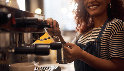 Image showing Coffee machine, closeup and barista steam milk in cafeteria for latte, espresso and catering drinks. Hands, happy waitress and heating jug for hot beverage, caffeine process and restaurant industry