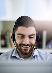 Image showing Communication, face or friendly man in call center consulting, speaking or talking at customer services. Virtual assistant, happy or sales consultant in telemarketing or telecom company help desk