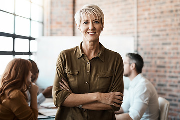 Image showing Portrait, senior and business woman with arms crossed in office meeting. Face, confidence and happy female entrepreneur, professional and person with pride for career, job and leadership at workplace