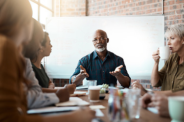 Image showing Meeting leader, business people and black man in office, talking or speaking. Teamwork, ceo and senior African male mentor coaching, training or planning strategy with mockup in corporate workplace.