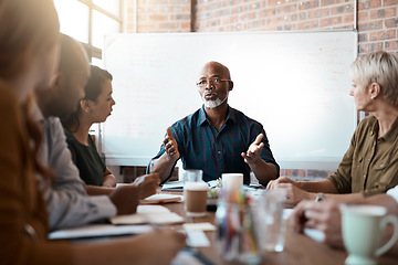 Image showing Business people, meeting and leadership of black man in office, talking or speaking. Teamwork, ceo and senior African male professional brainstorming, collaboration or planning strategy in startup.