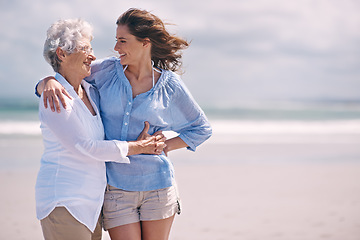 Image showing Beach, embrace and senior woman with young woman on the or at the beach together and outdoors. Mockup, happy and hugging elderly woman with adult daughter or at sea for leisure and travel