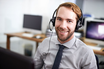 Image showing Portrait, call center and man with a smile, telemarketing and customer service with a headset. Face, male employee and happy consultant with headphones, tech support and communication with cm company