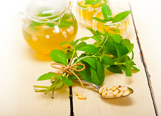 Image showing Arab traditional mint and pine nuts tea