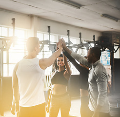 Image showing Celebration, high five and teamwork of people in gym for fitness, team building or solidarity. Collaboration, group of happy friends and celebrate workout targets, goal or support with lens flare.