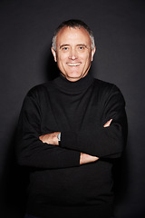 Image showing Portrait, smile and senior man with arms crossed, confident and wellness against a dark studio background. Face, happy male person and mature model with happiness, retirement and carefree with joy