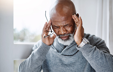 Image showing Headache, pain and senior man with migraine, mental health risk, retirement stress or mind problem at home. Memory, tired and sick or african person massage temple by window, brain fog and healthcare