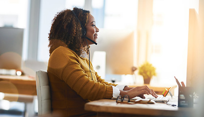 Image showing Typing, chat or happy woman in call center consulting, speaking or talking at customer services. Virtual assistant, computer or friendly consultant in telemarketing or telecom company help desk