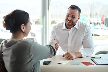 Image showing Meeting, handshake and business people in partnership, clients contract and agreement sign for career success. Happy professional man shaking hands with woman in job hiring, recruitment and interview