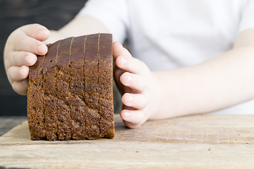 Image showing chunks of dark bread