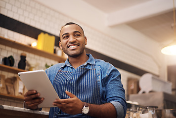Image showing Happy, tablet and waiter with man in cafe for online, entrepreneurship and startup. African, technology and food industry with small business owner in restaurant for barista, network and coffee shop