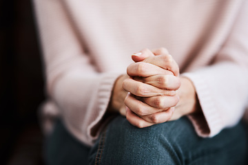 Image showing Woman, hands together and closeup with stress and anxiety in therapy for psychology crisis. Pray, mental health and problem with hand of a female patient scared with depression at counselling on sofa