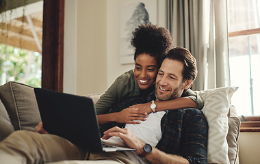 Image showing Laptop, streaming and an interracial couple watching a movie using an online subscription service for entertainment. Computer, relax or internet with a man and woman bonding together over a video