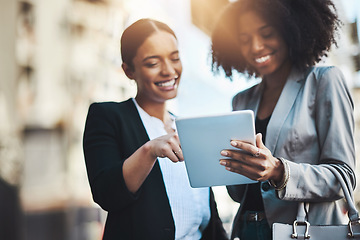 Image showing Happy business people, tablet and smile in city for social media, communication or team collaboration. Woman, friends and smiling in teamwork working on technology for research or networking in town