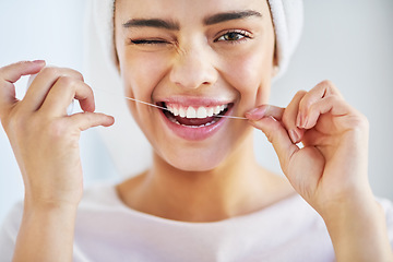 Image showing Portrait, smile and woman with floss, dental and hygiene with wellness, happiness and fresh breath. Face, female person and girl with oral health, bathroom and cleaning with self care and cosmetics