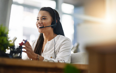 Image showing Customer service, contact us or happy woman in call center consulting, speaking or talking at help desk. Virtual assistant, friendly agent or sales consultant in telemarketing or telecom company