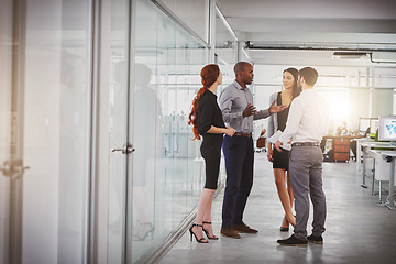 Image showing Business people, group and discussion in office hallway with men, women or diversity for strategy at startup. Businessman, leader or talking for motivation, teamwork or brainstorming for company goal