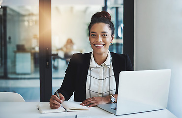 Image showing Business woman, portrait and writing in a office with planning notes and corporate laptop. Female person, employee and work planner book with company paperwork and online for professional project