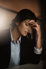 Image showing Tired, headache and business woman in pain at night for career migraine, burnout and mental health risk or depression. Depressed, anxiety or person with mistake stress, frustrated or fatigue problem