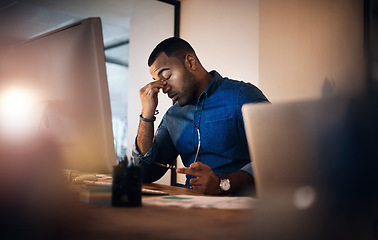 Image showing Headache, eye strain and businessman in the office at night working on deadline project. Burnout, stress and professional male employee with migraine doing research on computer overtime in workplace.