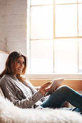 Image showing Thinking, tablet and bank payment with a woman online shopping on a sofa in the living room of her home. Ecommerce, financial and fintech banking with a young female online customer in her house