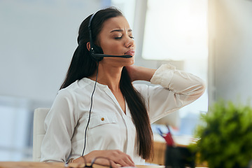 Image showing Stress, customer service or woman in call center with neck pain injury while working in telecom help desk. Accident, injured agent or tired sales girl with joint pain emergency, fatigue and burnout