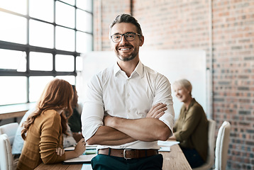 Image showing Portrait, smile and man with startup, arms crossed and teamwork with confidence, workplace and happiness. Face, male CEO and leader in a workshop, meeting and collaboration for brainstorming