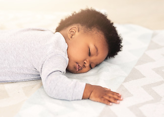 Image showing Baby, african boy and sleeping on bed for rest, health and peace for growth, development and relax in family home. Black male infant, tired and sleep in bedroom with fatigue, quiet and calm in house