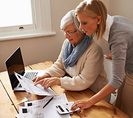 Image showing Mother, senior woman and bills or laptop or calculator on table for budget and savings at home. Retirement, finances and elderly female person or doing taxes or pension in the house with pc or tech