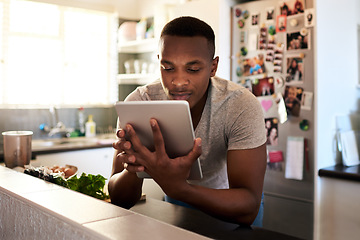 Image showing Search, cooking and tablet with black man in kitchen for website, food and breakfast blog. Internet, technology and health with person reading online at home for nutrition, digital and morning