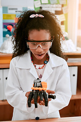 Image showing Excited, education and girl with a robot, science class and innovation with progress, creativity and development. Female child, girl and student with technology, robotics and learning with excitement