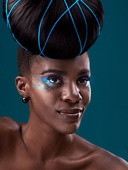 Image showing Idea, hair care and cosmetics with a model black woman in studio on a blue background for beauty. Thinking, makeup and face with an attractive young female person at the salon for fashion or styling