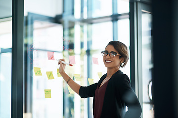 Image showing Business woman, portrait and writing on glass moodboard for marketing ideas, brainstorming workflow or project. Professional worker or person, sticky notes and schedule, reminder or creative solution