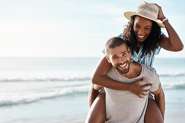 Image showing Love, ocean and piggyback, happy couple with space for mockup, blue sky and romantic summer holiday travel to beach. Romance, man and woman have fun at sea on date and tropical vacation together