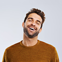 Image showing Laughing, comedy and portrait of happy man by white background. Smile, confident and face laugh of comic person, isolated and young male model enjoying a comedy joke on a studio backdrop