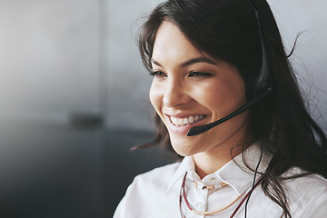 Image showing Business woman, face and telemarketing employee with a smile and mockup on a crm call. Communication, customer service and young female person working on a web support consultation with happiness