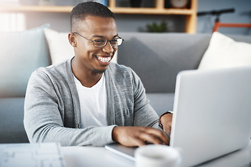 Image showing Laptop, home and African man or student elearning, online course and college or university application or typing in living room. Happy african person on computer for education or scholarship research