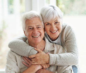 Image showing Portrait, smile and senior couple with love, hug and romance with retirement, relationship and bonding. Face, happy mature woman and elderly man embrace, home and marriage with commitment and loving