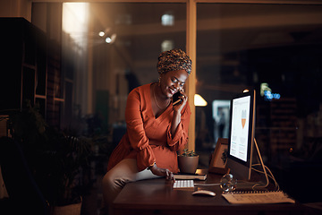 Image showing Business, black woman and phone call on smartphone, computer typing and conversation at night. Happy worker, cellphone and communication for desktop management, mobile network and overtime in office