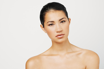 Image showing Natural beauty, Asian woman and portrait with skincare and dermatology with mockup. Isolated, white background and young female person with face makeup and skin glow from cosmetics and treatment